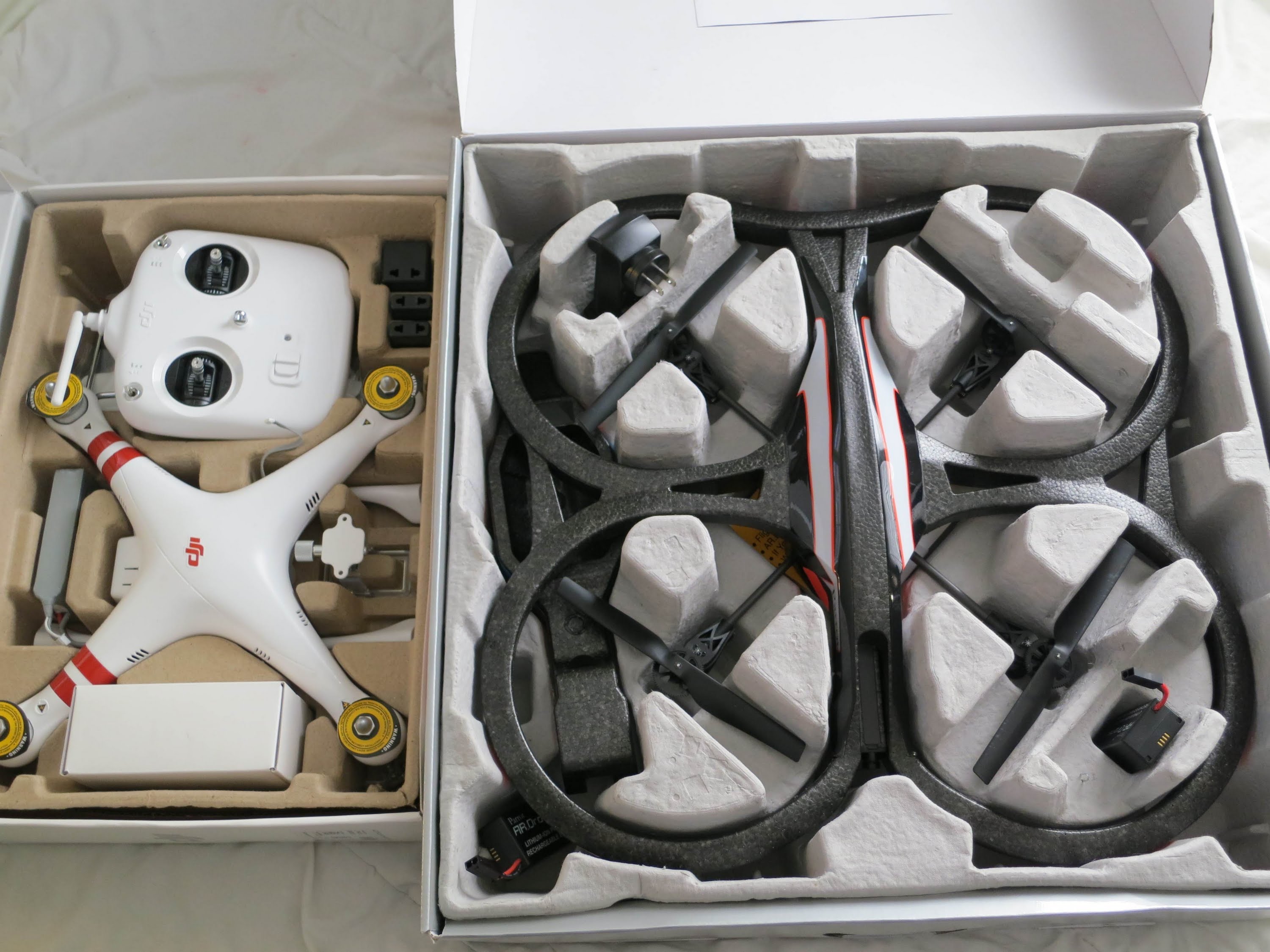 Maak het zwaar Kleren Bloemlezing Drone Duel: DJI Phantom vs. Parrot AR - DRONELIFE