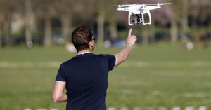 A pilot flies a drone at the 4th Intergalactic Meeting of Phantom's Pilots in an open secure area in the Bois de Boulogne, western Paris