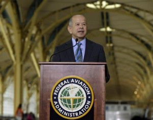 FAA Administrator Huerta holds news conference announcing expanded use of portable electronic devices at Reagan National Airport in Washington