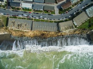 On January 25, 2016, a state of emergency was declared in Pacifica, California, after king tides and storm surge pummeled the coastline. Many of the apartments in Pacifica are hanging off of soft sandstone cliffs and are in danger of falling off. Photo taken January 26, 2016.