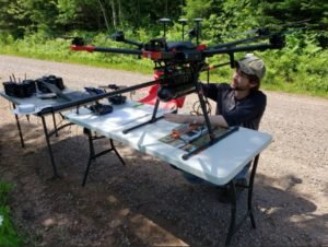 A researcher with a drone