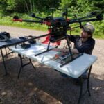 A researcher with a drone