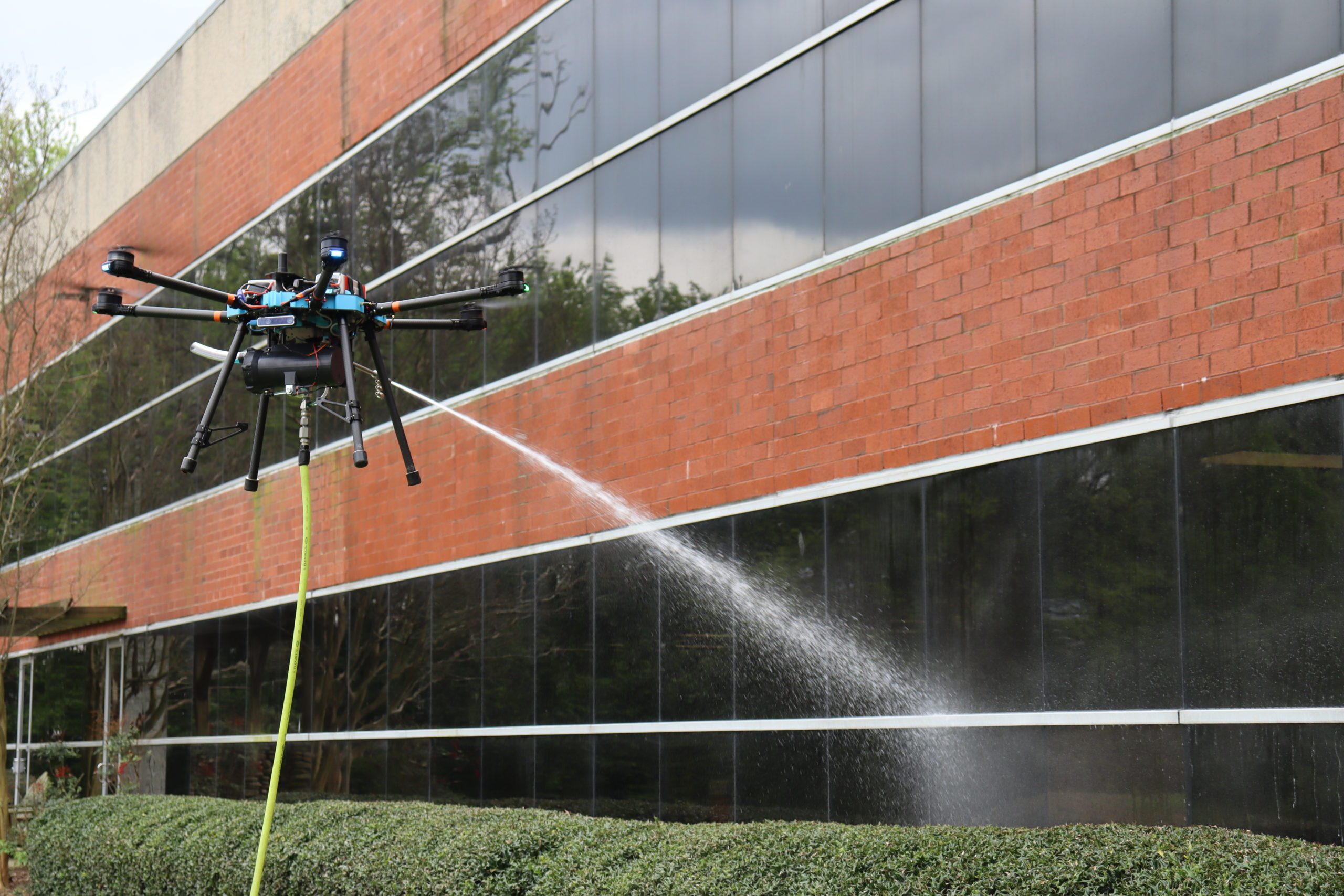 Lucid Spraying Drones Wash Windows and Walls DRONELIFE